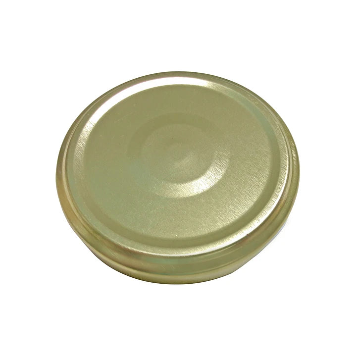 TAPA METÁLICA 66MM DORADA C/BOTÓN