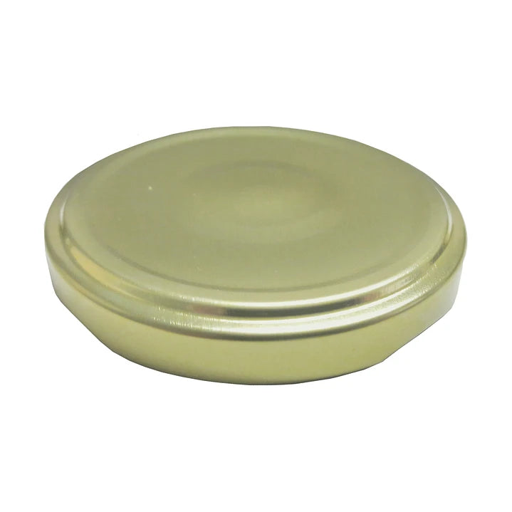 TAPA METÁLICA 63MM DORADA C/BOTÓN