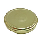 TAPA METÁLICA 63MM DORADA C/BOTÓN